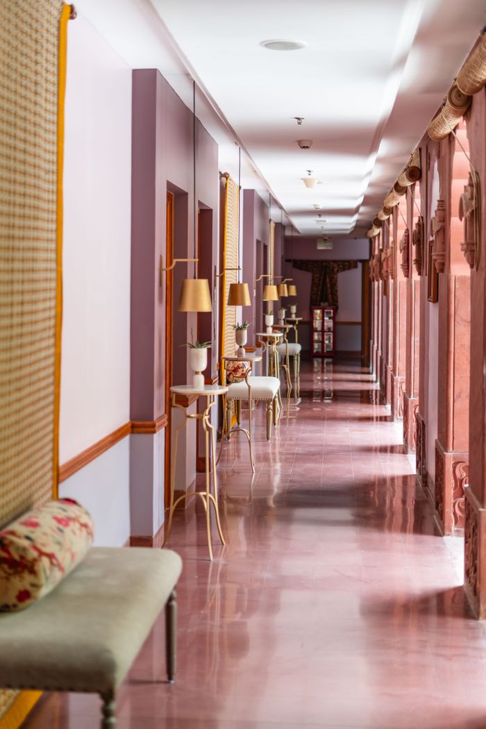 about-04 Explore the elegance of a heritage hotel corridor in Bikaner, showcasing luxurious Rajasthani design.